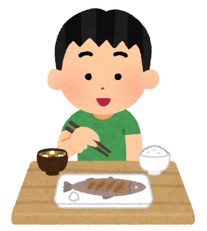 魚を食べる男の子のイラスト